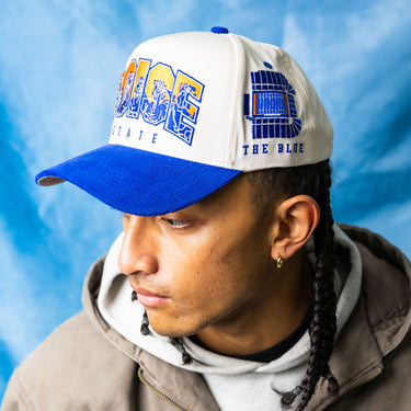 Boise State Broncos Cream and Blue Snapback Hat with Stampede Logo and The Blue Patch - On Model Lifestyle