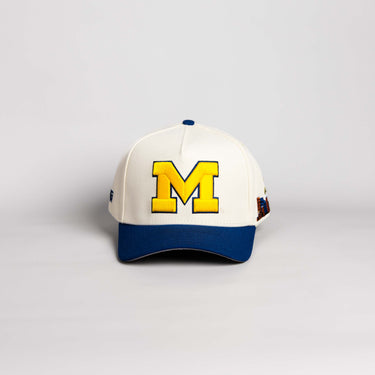 Michigan Wolverines Hat Cream and Navy Suede Stadium Patch Snapback - Front Panel