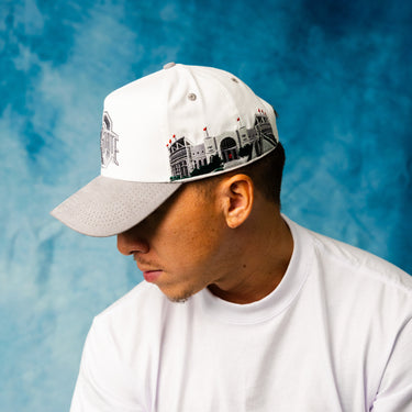 Ohio State Buckeyes White and Grey Suede Snapback Hat with Block O Logo and Horseshoe Stadium Patch - On Model Side Profile Lifestyle