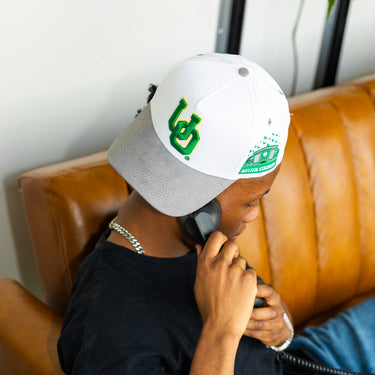 Oregon Ducks UO Hat White Grey Suede Brim Autzen Stadium Patch Snapback - On Model Seated