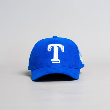 Tonga Blue Suede Snapback Hat with White T Logo and Coat of Arms Patch - Front Panel