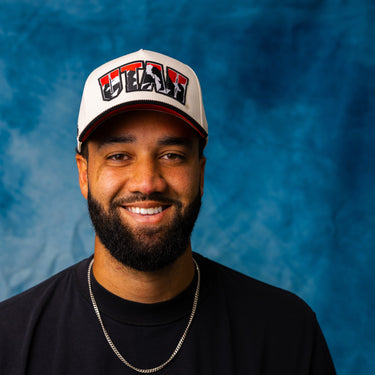 Utah Utes Vintage Cream and Black Snapback Hat with Red Mountain Logo Embroidery - On Model Lifestyle