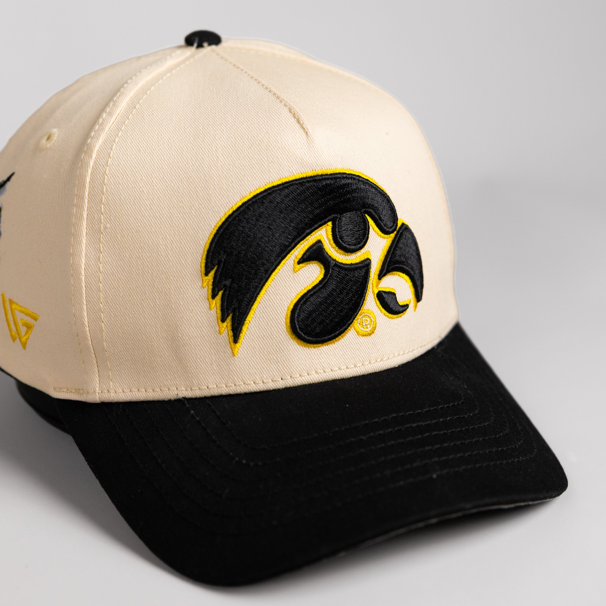 Iowa Hawkeyes Hat Cream & Black Suede Full Stadium - Angled View