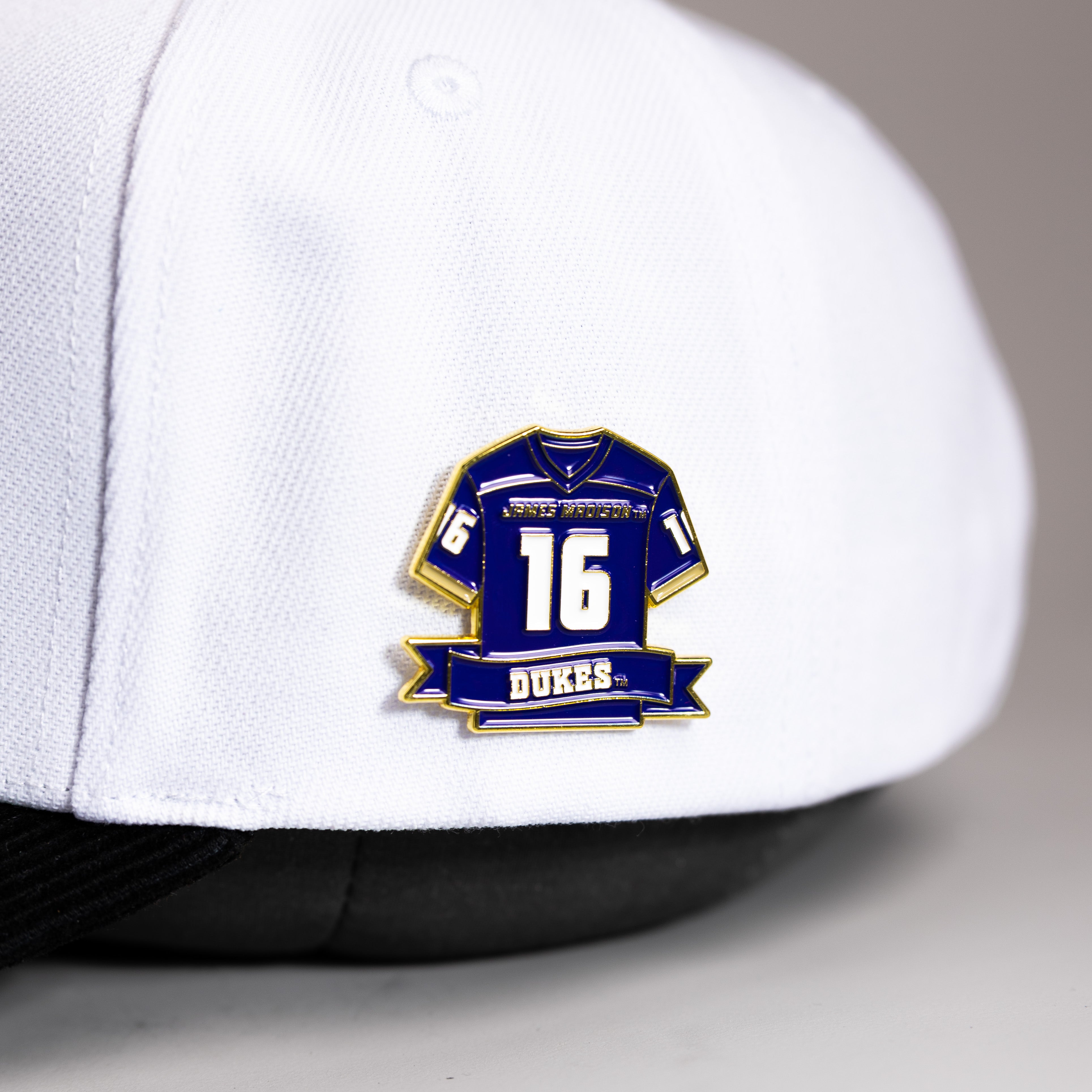 James Madison Dukes Jersey Pin Officially Licensed Collectible - On Hat Detail