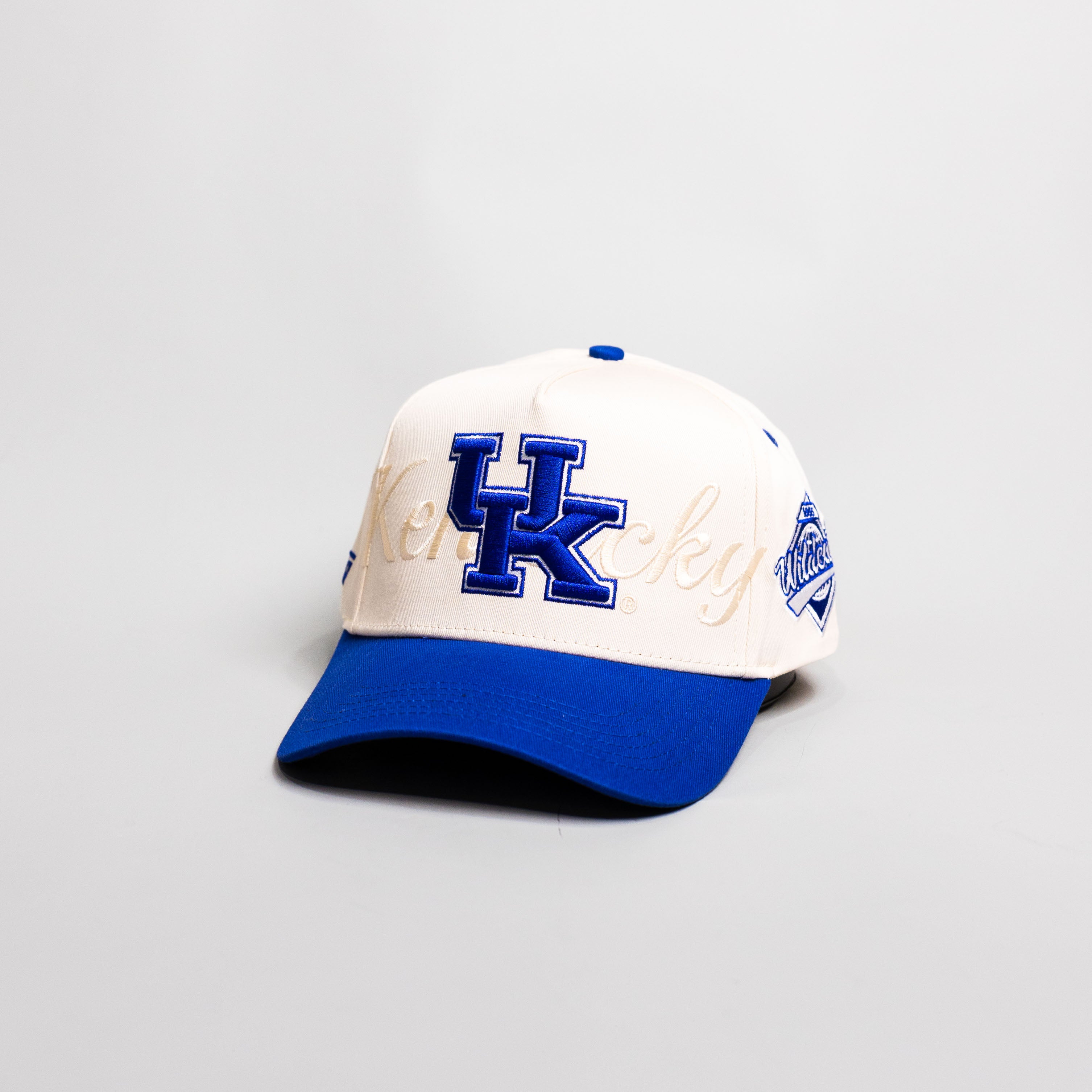 Kentucky Wildcats UK Hat Cream Royal Blue Brim Wildcats Patch Rope Snapback - Angled View