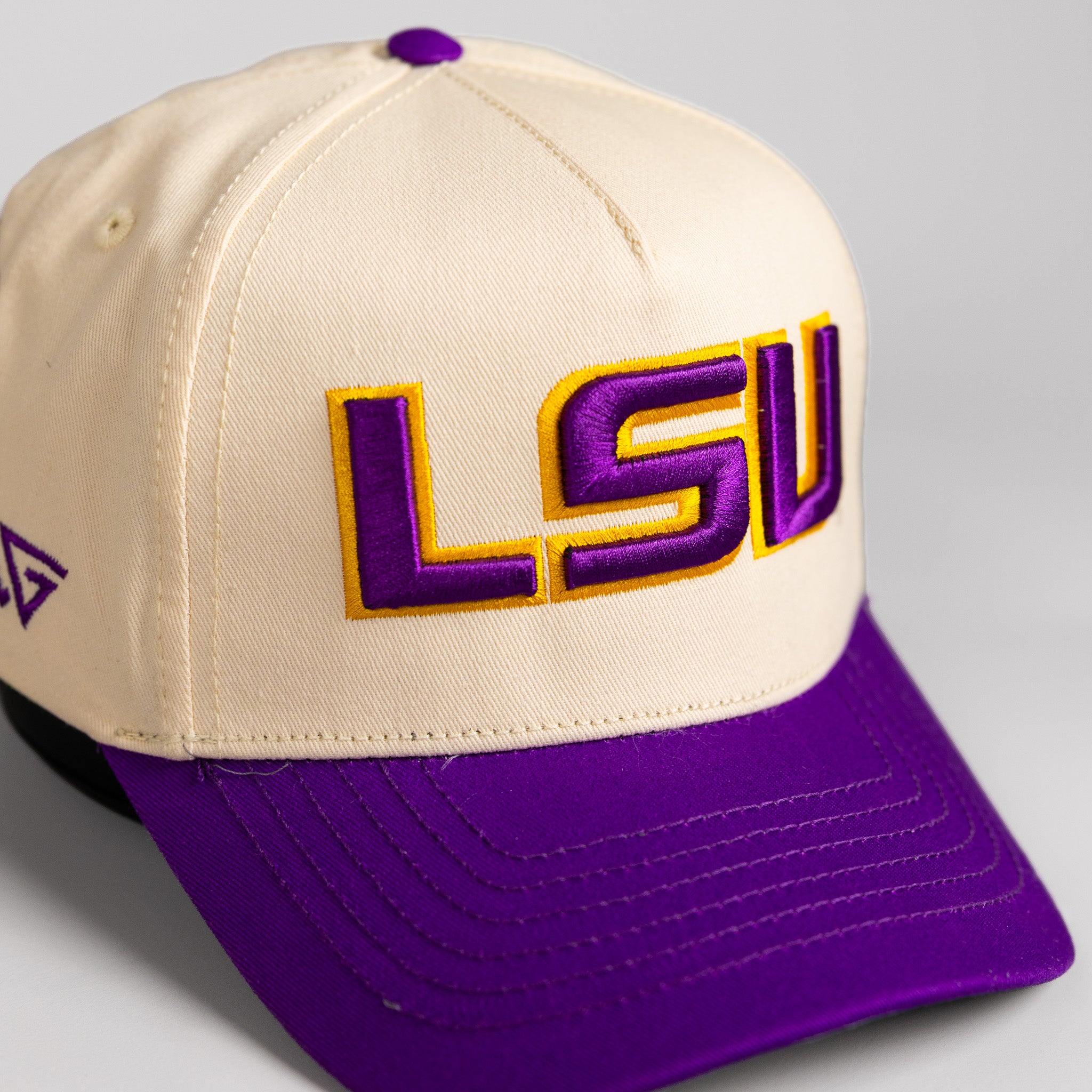 LSU Tigers Hat Cream & Purple Full Stadium Snapback - Angled View