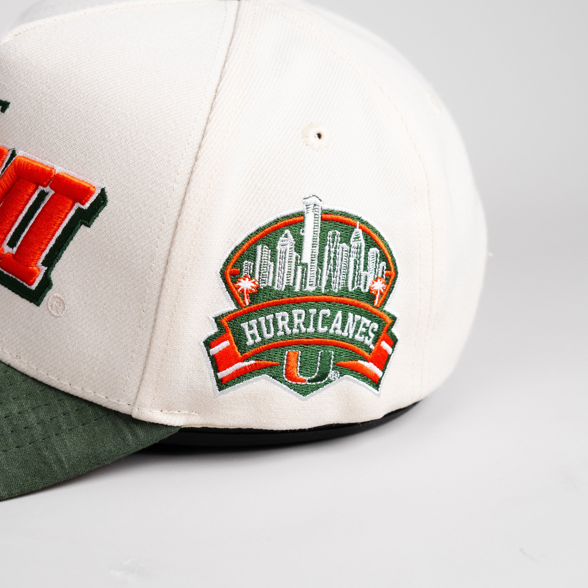 Miami Hurricanes Hat Cream & Green Suede Tilt Snapback - Side Patch Detail