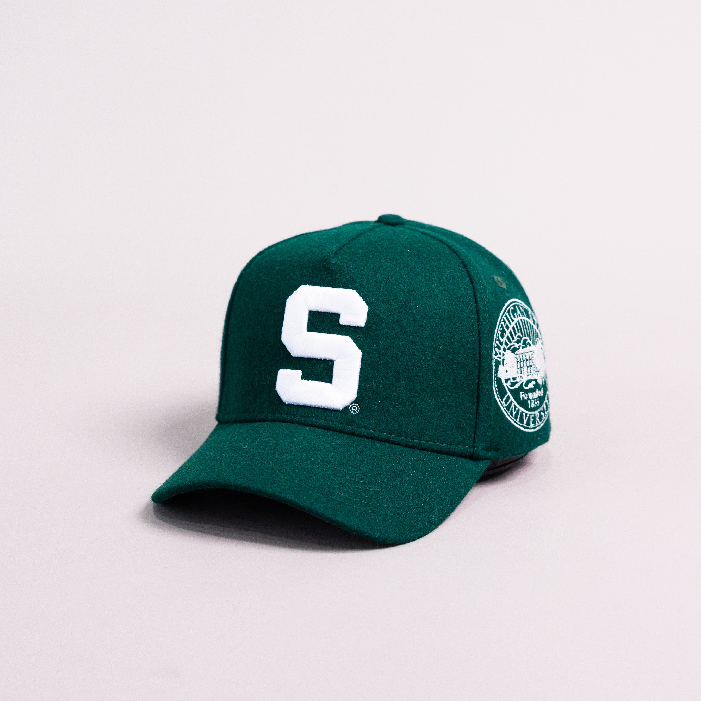 Michigan State Spartans Green Wool Snapback Hat with Block S Logo and University Seal Patch - Angled View