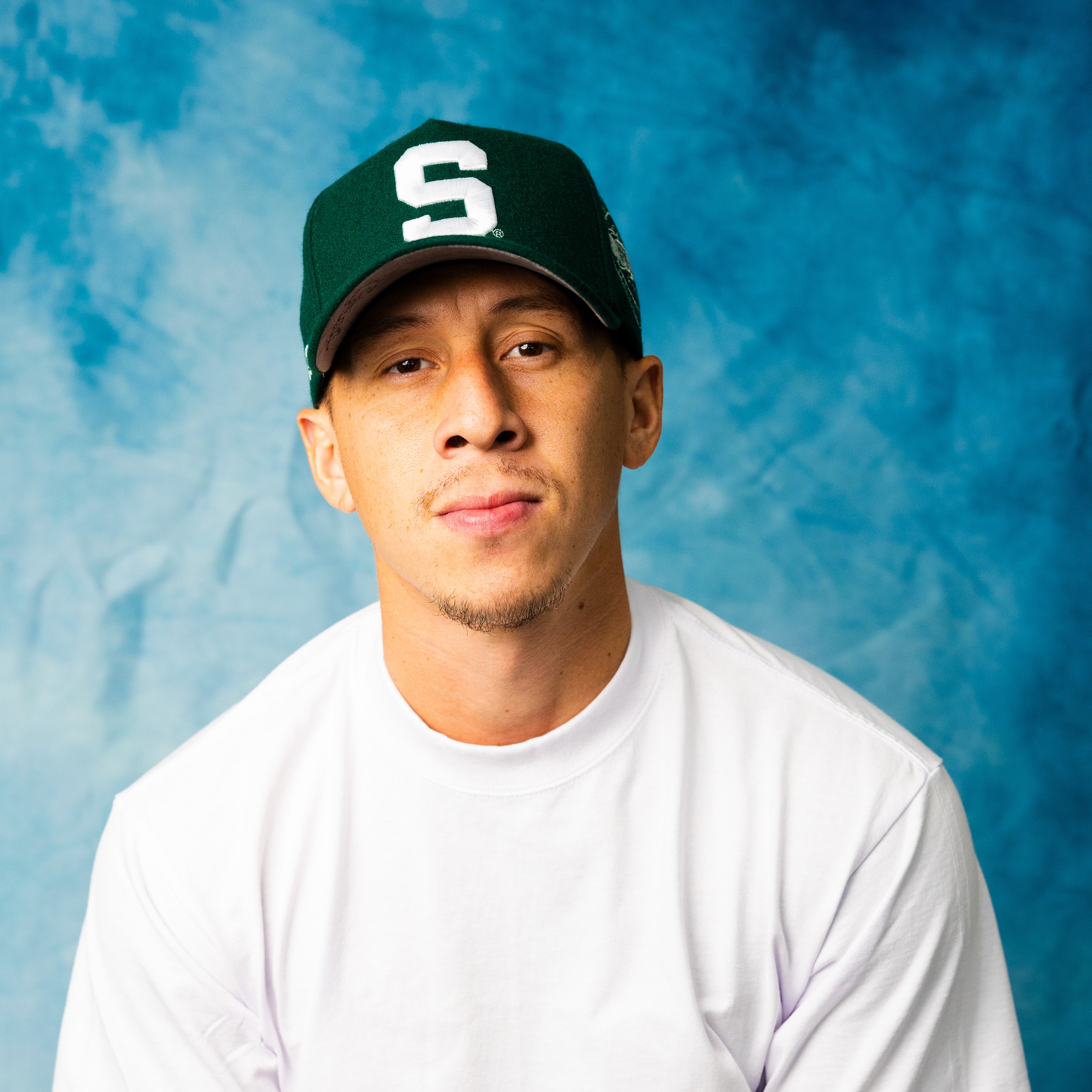 Michigan State Spartans Green Wool Snapback Hat with Block S Logo and University Seal Patch - On Model Portrait Lifestyle