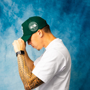 Michigan State Spartans Green Wool Snapback Hat with Block S Logo and University Seal Patch - On Model Side Profile Lifestyle