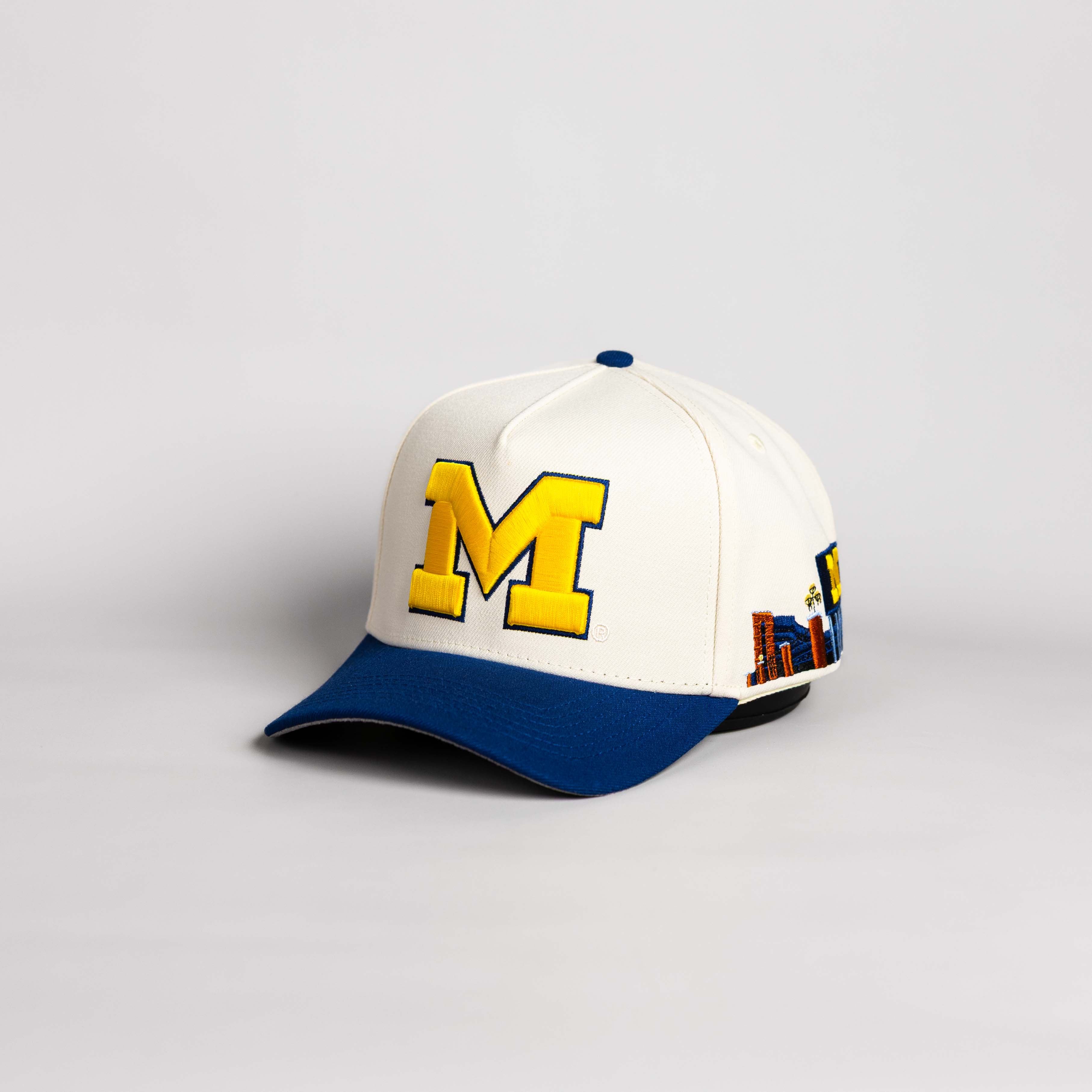Michigan Wolverines Hat Cream and Navy Suede Stadium Patch Snapback - Angled View