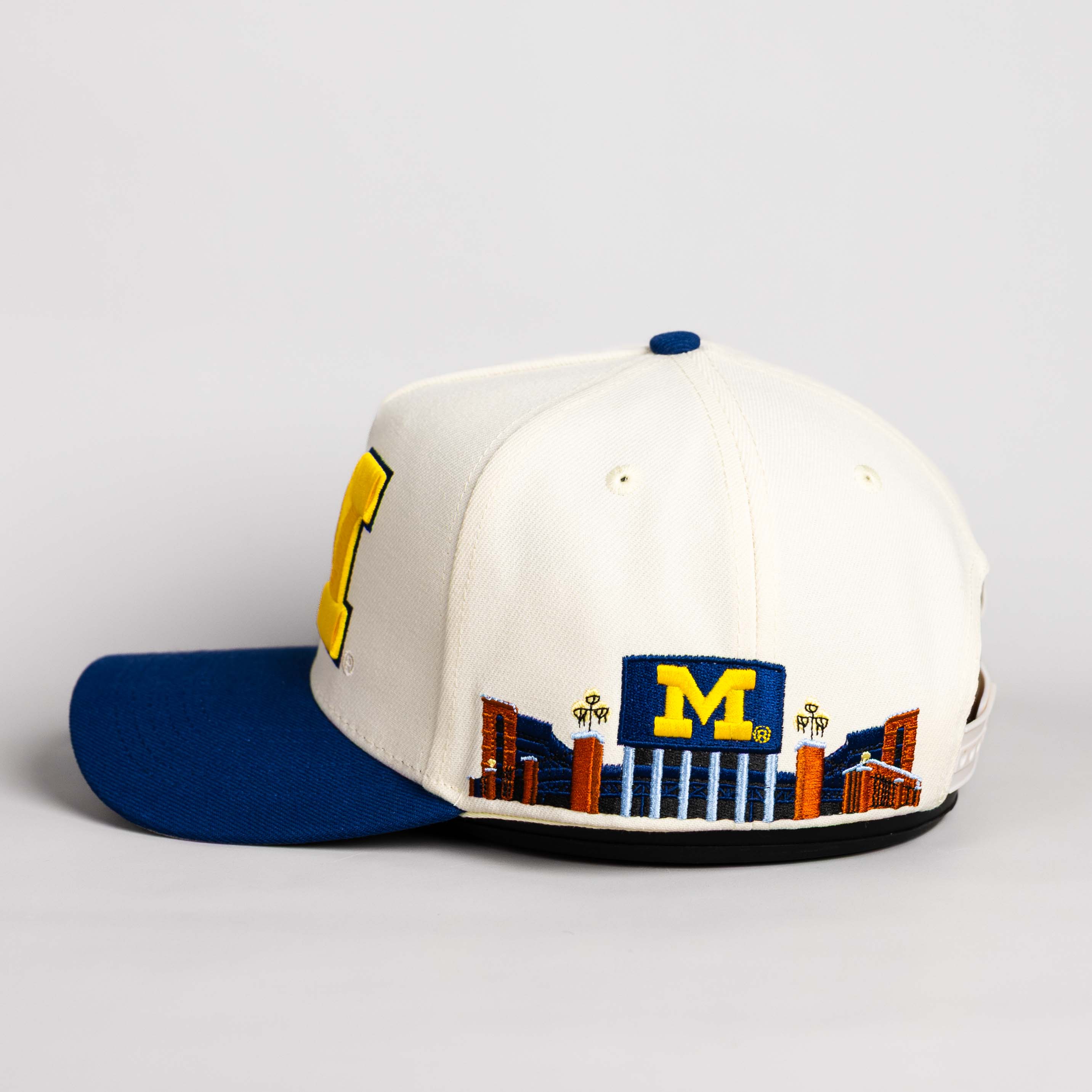 Michigan Wolverines Hat Cream and Navy Suede Stadium Patch Snapback - Side Stadium