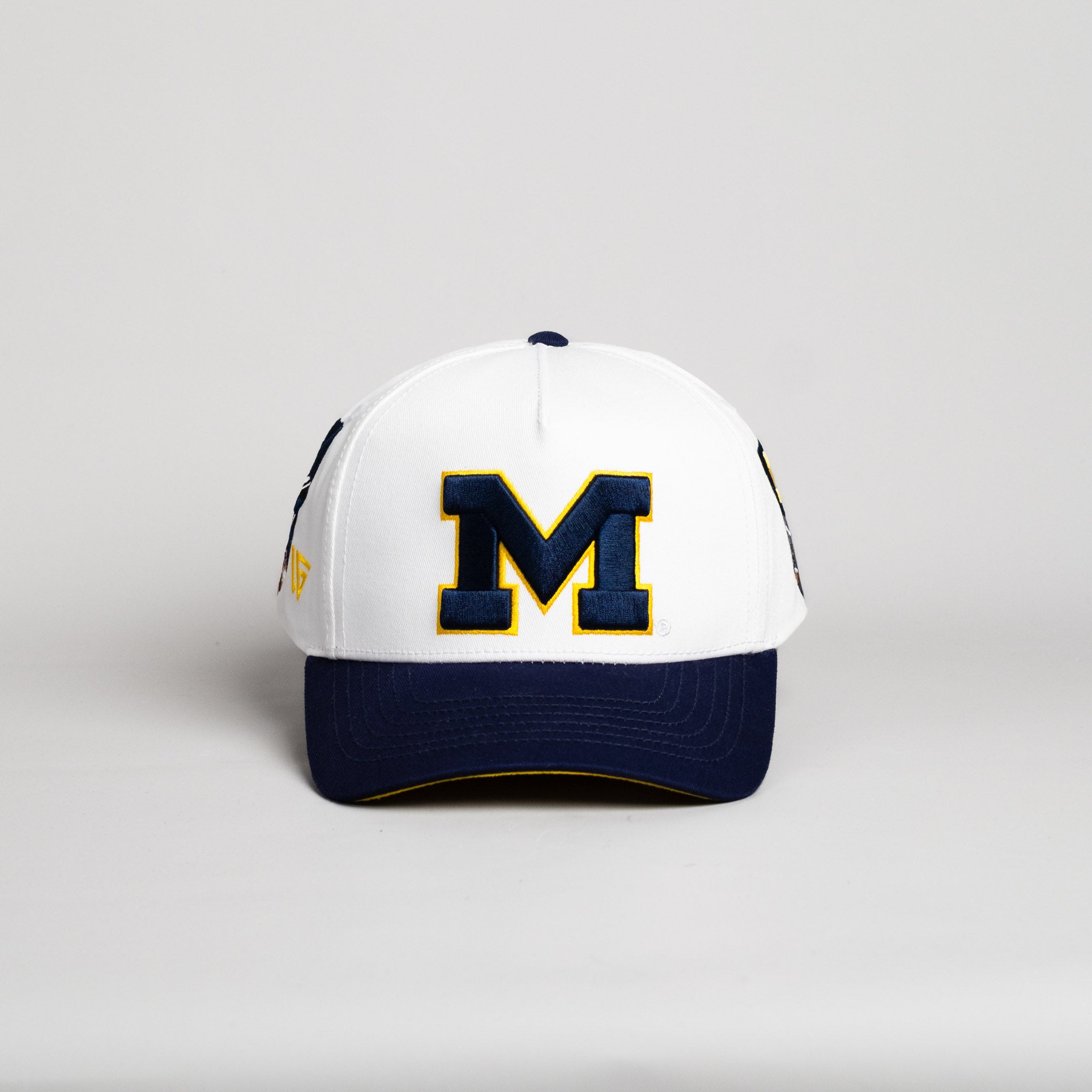 Michigan Wolverines Hat Cream & Navy Big House Full Stadium - Front Panel