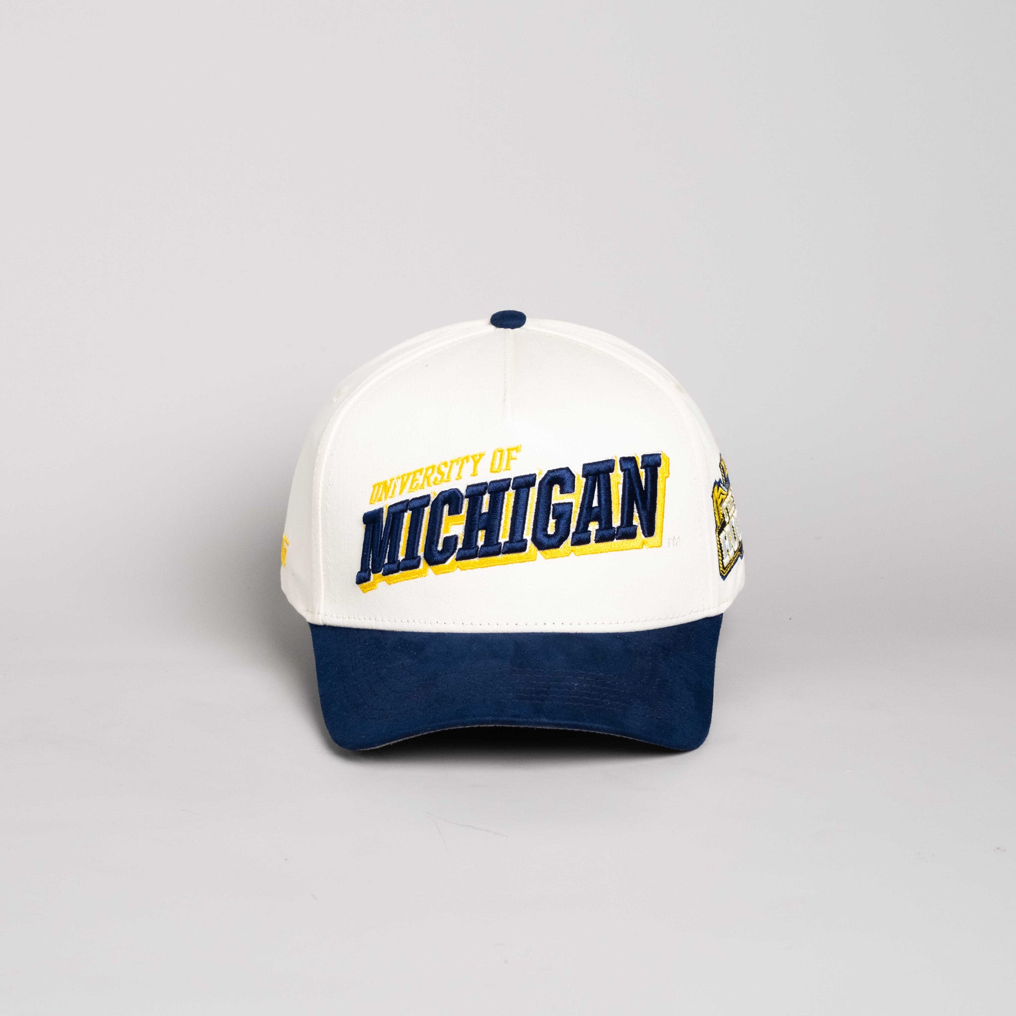 Michigan Wolverines Hat Cream & Navy Blue Tilt Snapback - Front Panel