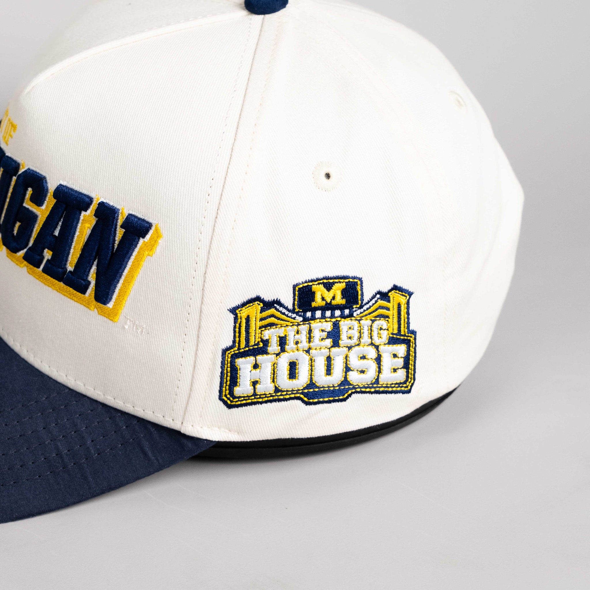 Michigan Wolverines Hat Cream & Navy Blue Tilt Snapback - Side Patch Detail