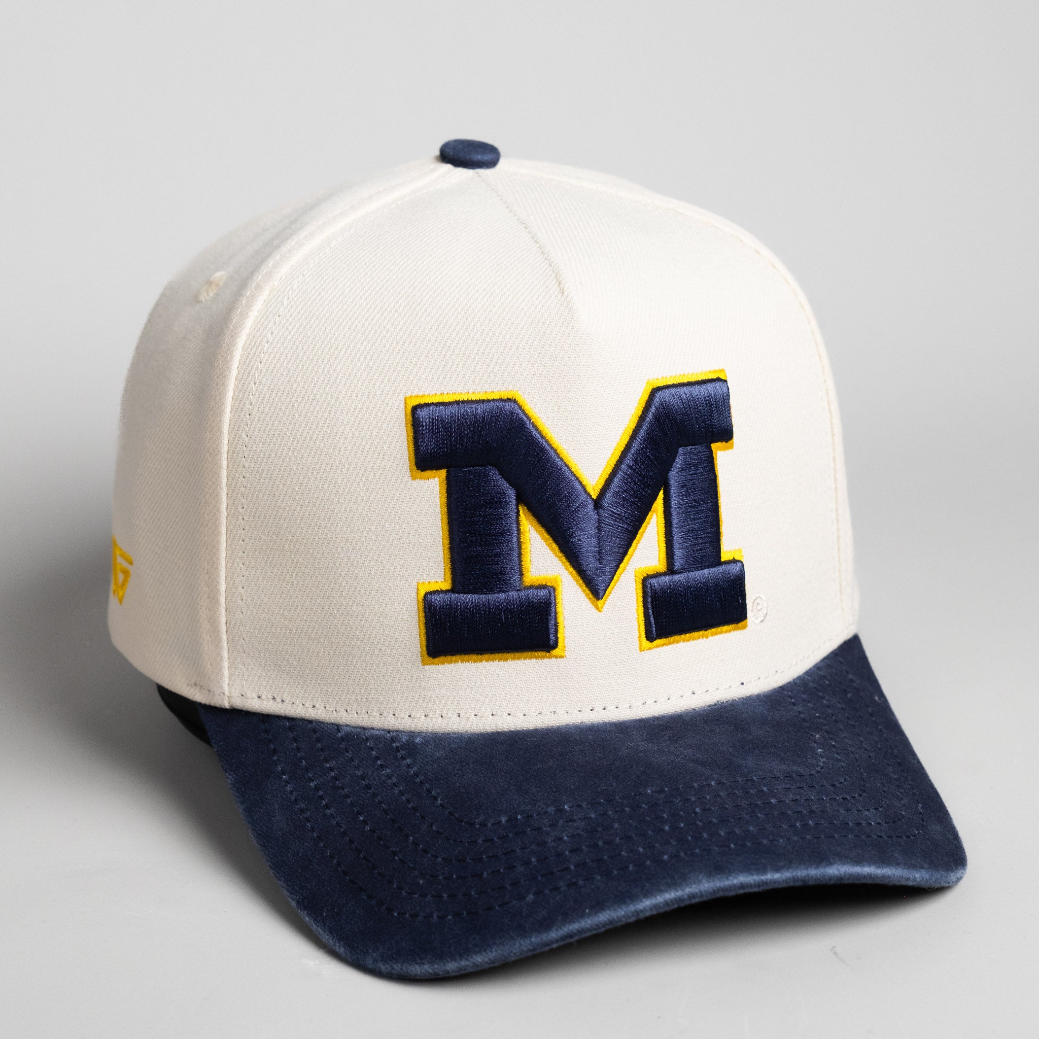 Michigan Wolverines Hat Cream & Navy Sun Fade Snapback - Angled View