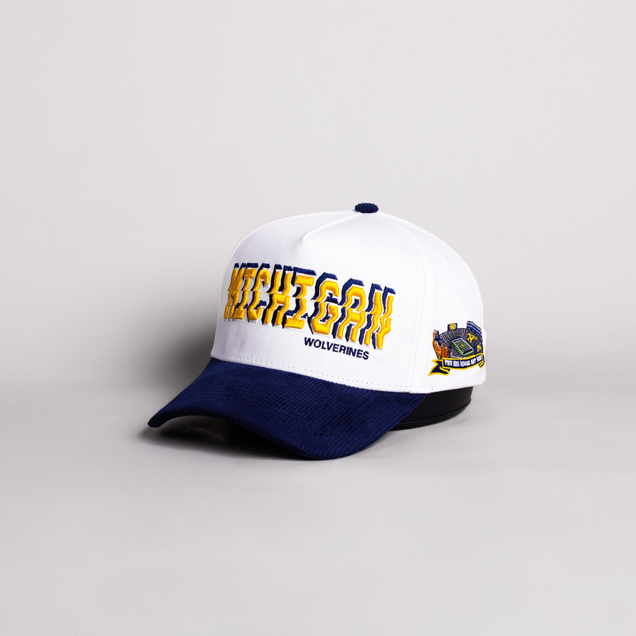 Michigan Wolverines Hat White & Navy Corduroy Stadium Pulse Snapback - Angled View