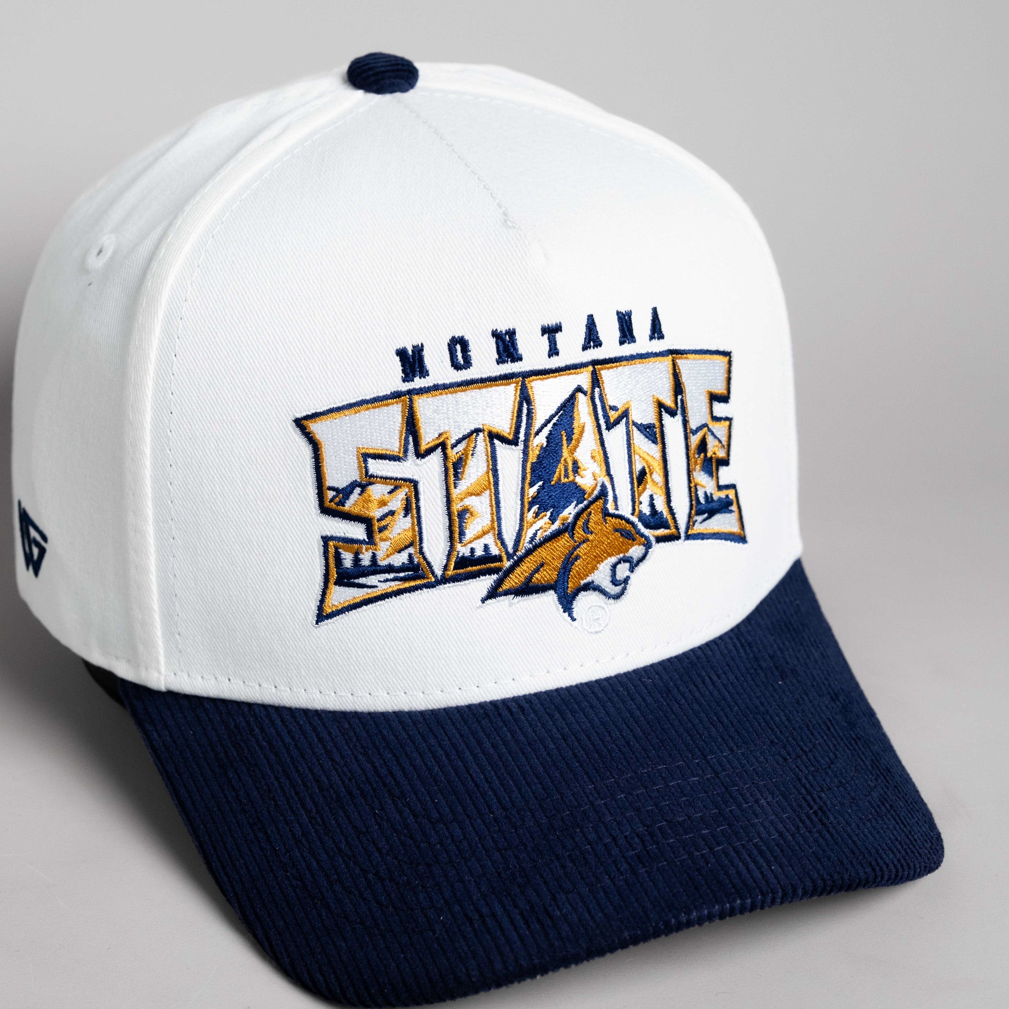 Montana State Bobcats Hat White & Navy Corduroy Mountain Snapback - Angled View