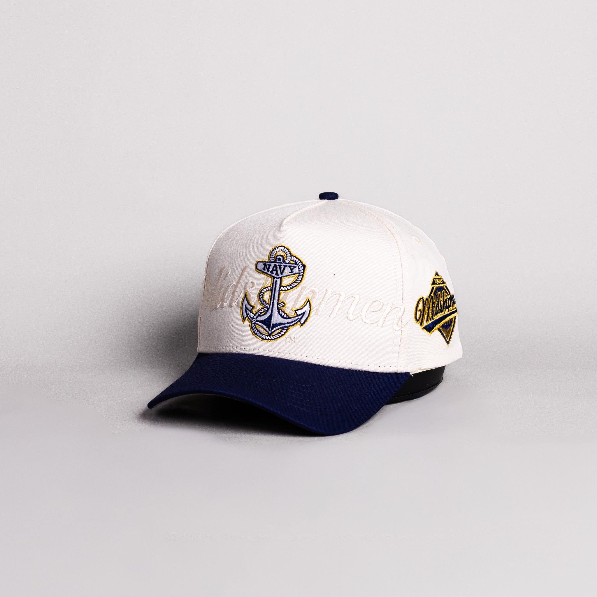 Navy Midshipmen Anchor Hat Cream Cotton Navy Brim Midshipmen Script Snapback - Angled View