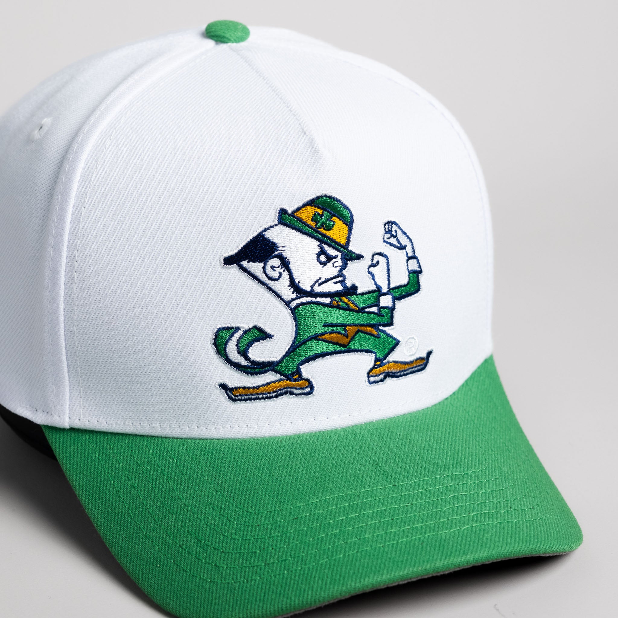 Notre Dame Fighting Irish Hat White & Green Suede Snapback - Angled View