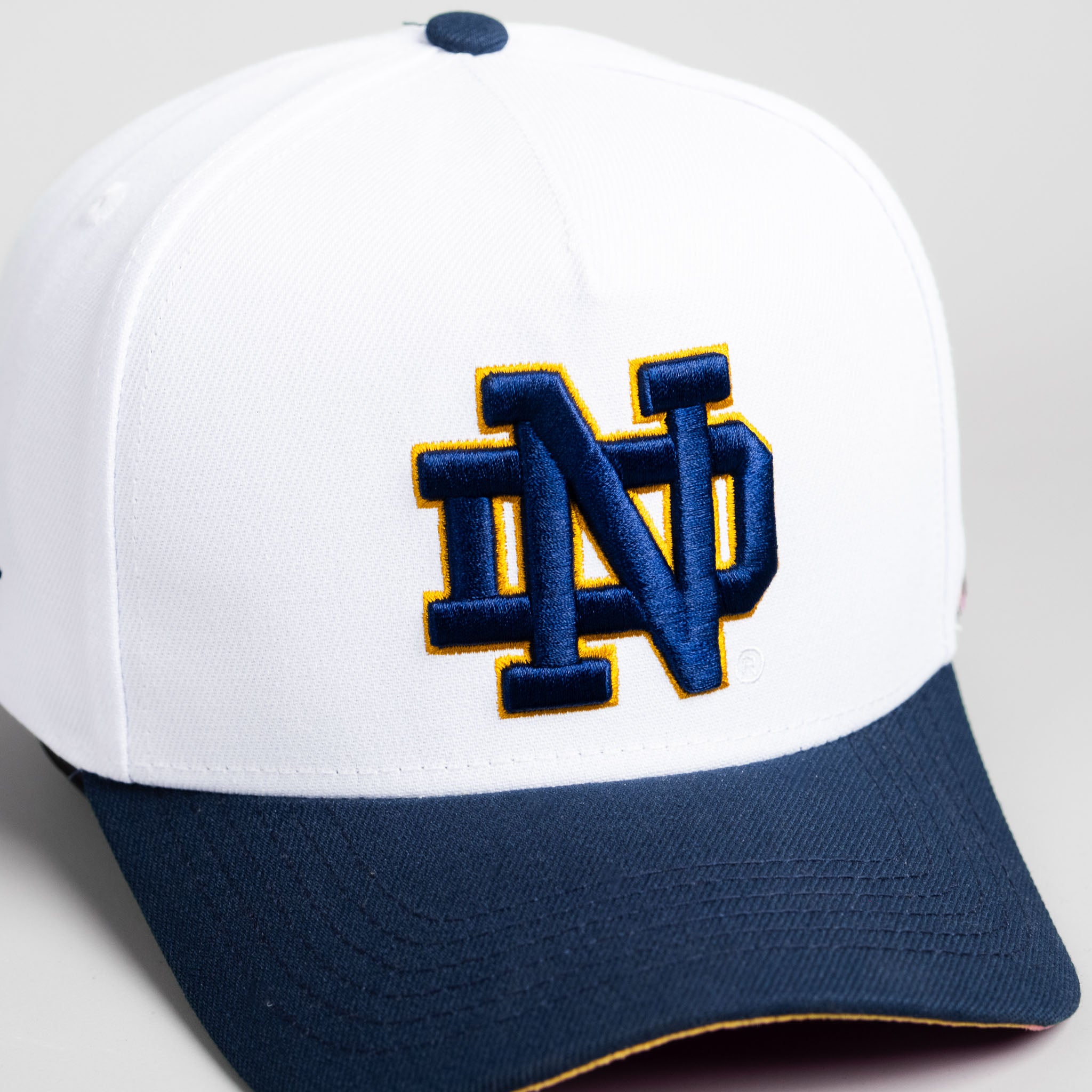 Notre Dame Fighting Irish Hat White & Navy Side Stadium Snapback - Angled View