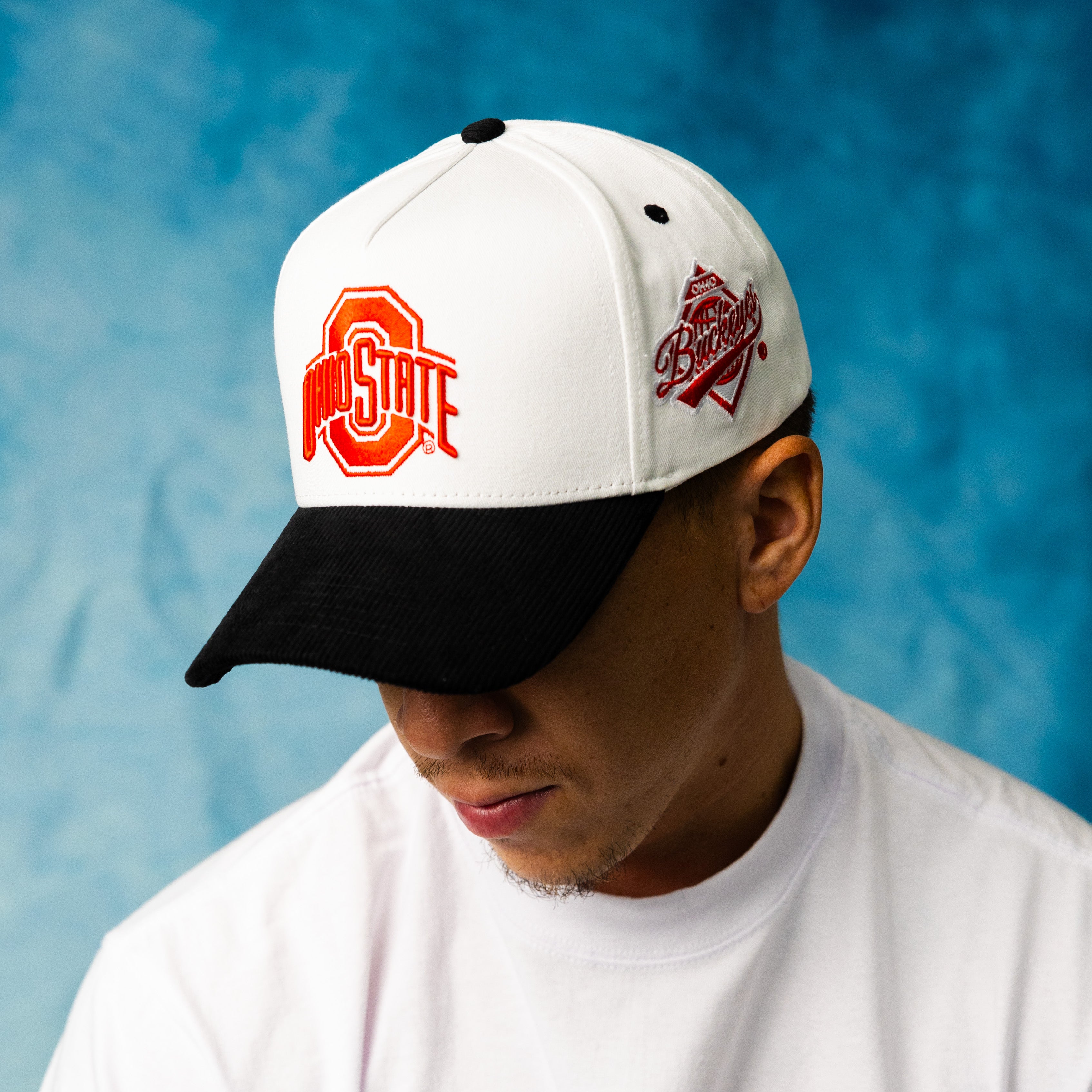 Ohio State Buckeyes White and Black Snapback Hat with Block O Logo and Buckeyes Side Patch - On Model Lifestyle