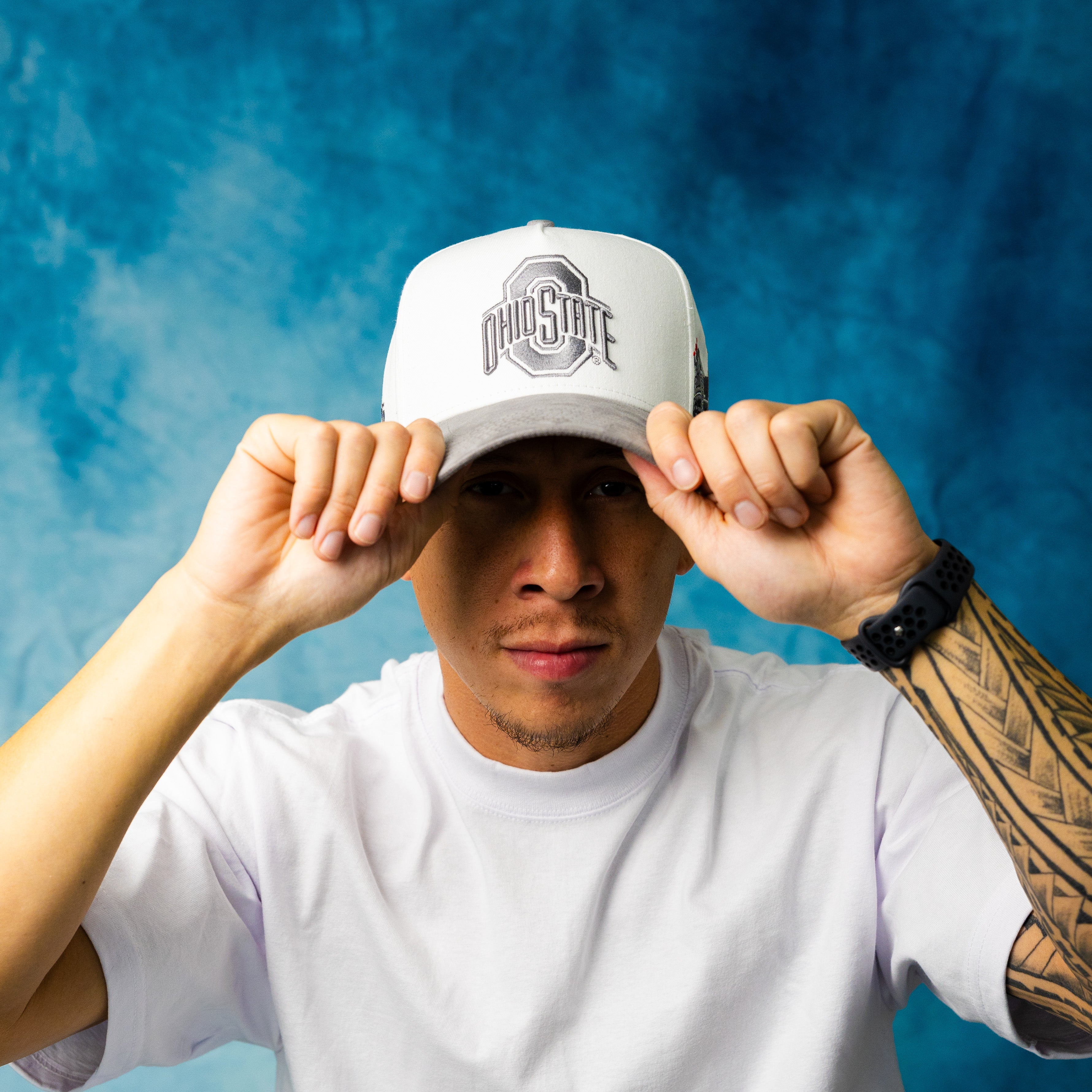 Ohio State Buckeyes White and Grey Suede Snapback Hat with Block O Logo and Horseshoe Stadium Patch - On Model Lifestyle