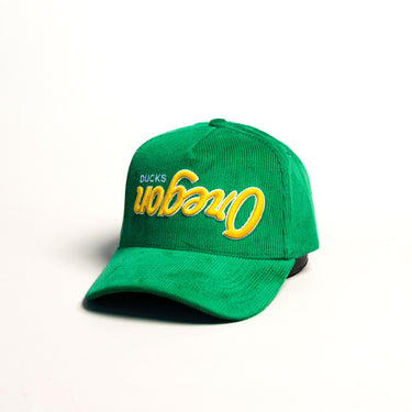 Oregon Ducks Flipped Script Hat Green Corduroy Yellow Logo Snapback UO - Angled View