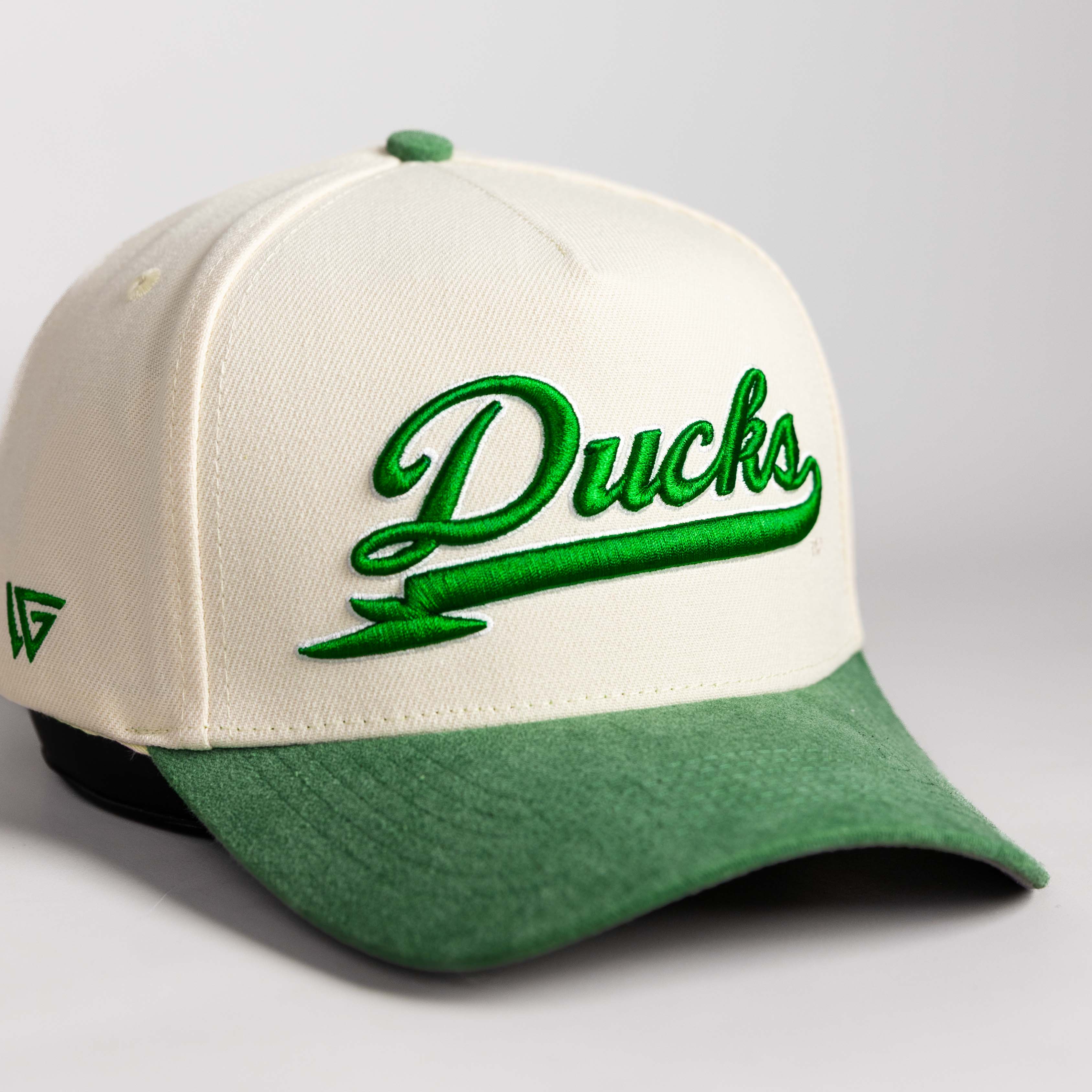 Oregon Ducks Hat Cream & Green Sun Fade Snapback - Angled View