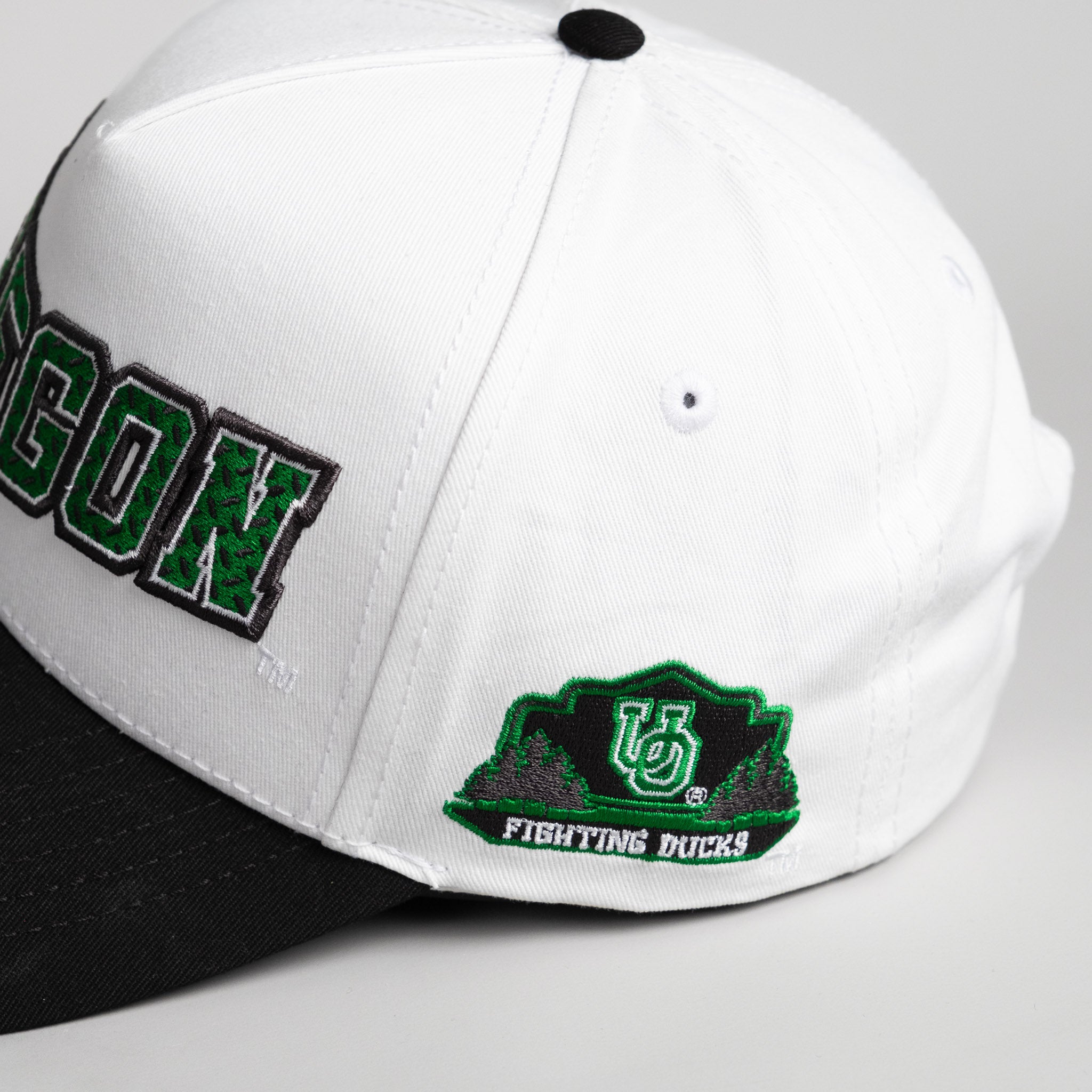 Oregon Ducks Hat White & Black Corduroy Flying V - Angled View