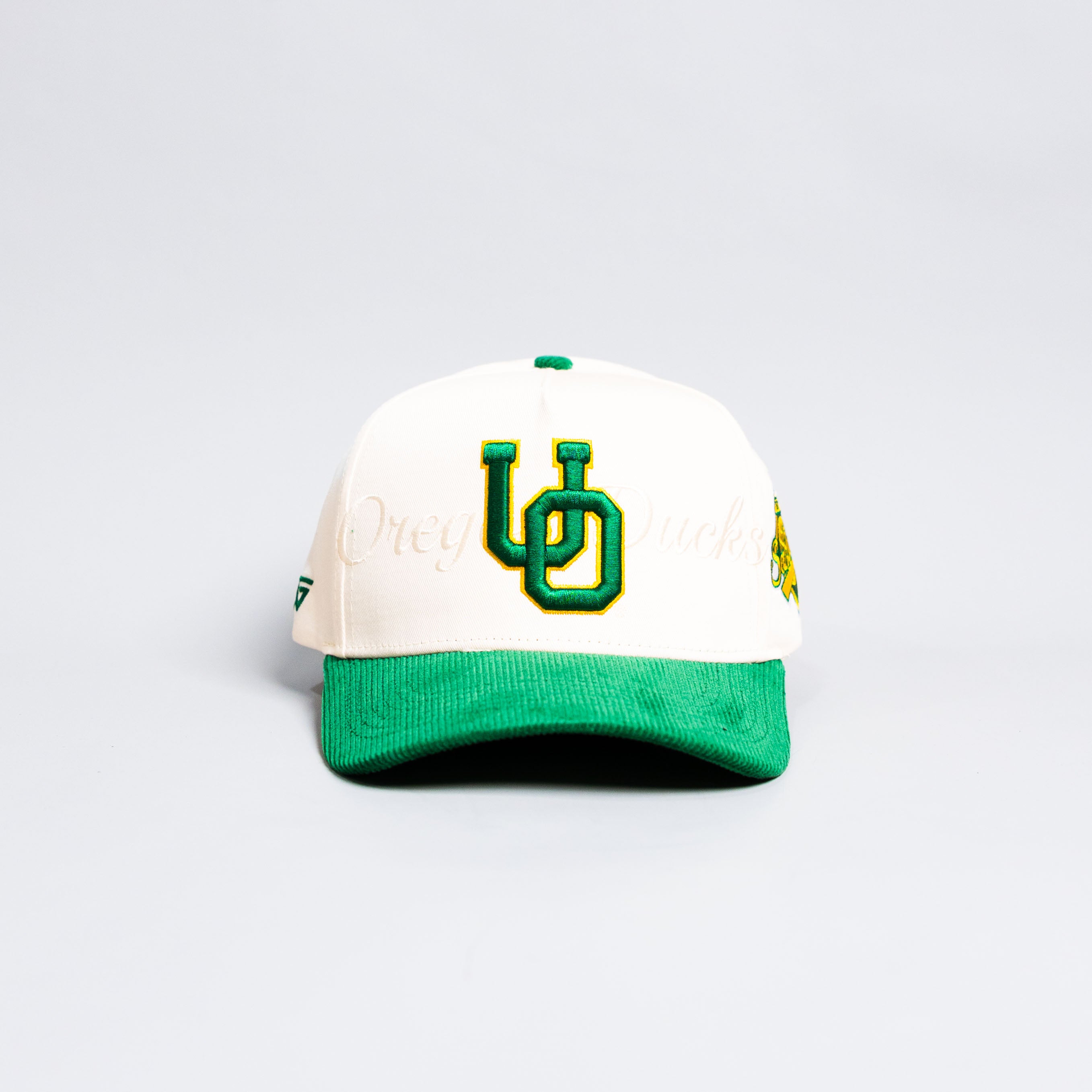Oregon Ducks Stacked Letter Logo Hat Cream and Green Corduroy Snapback - Front Panel