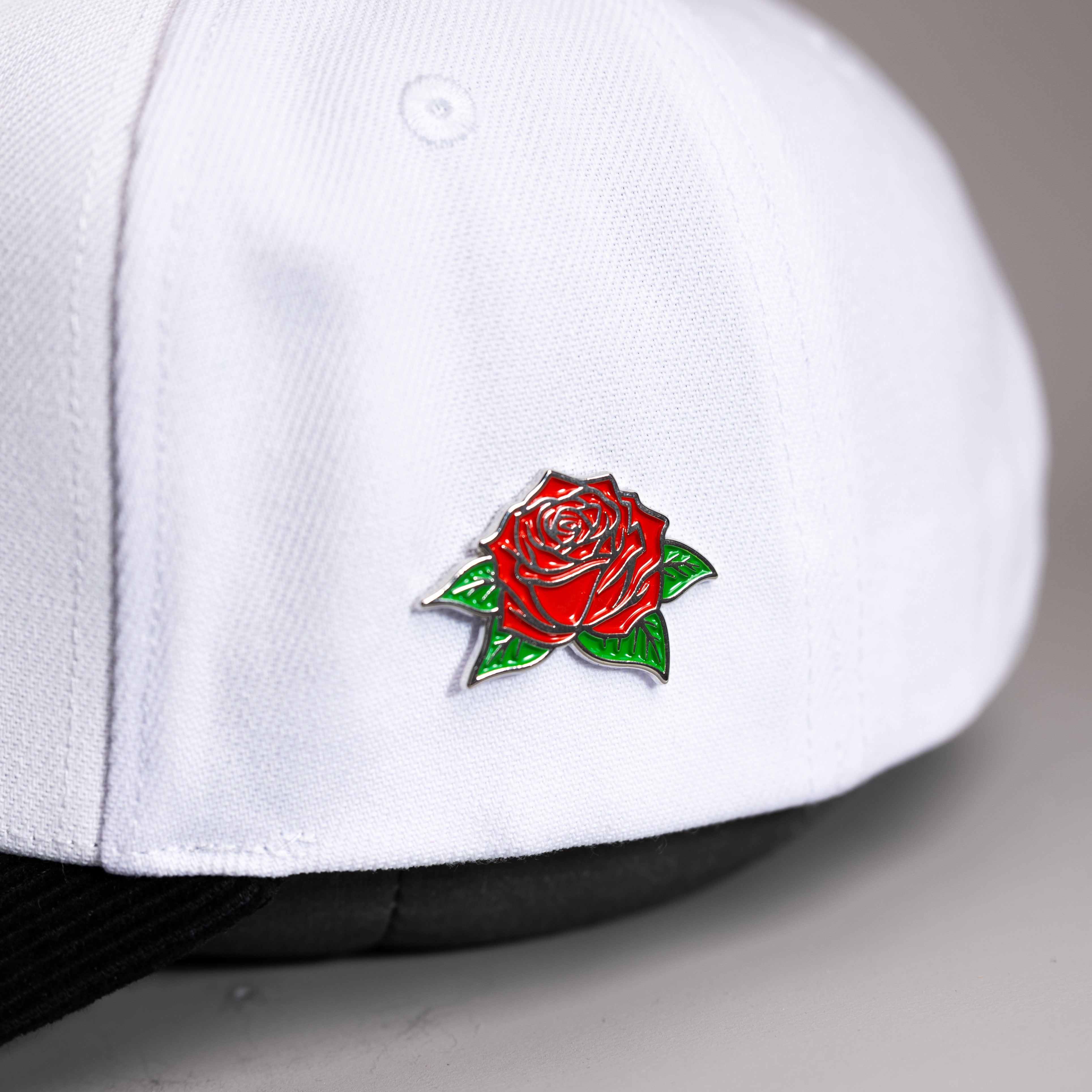 Rose Pin Collectible Enamel Lapel Pin - On Hat Detail