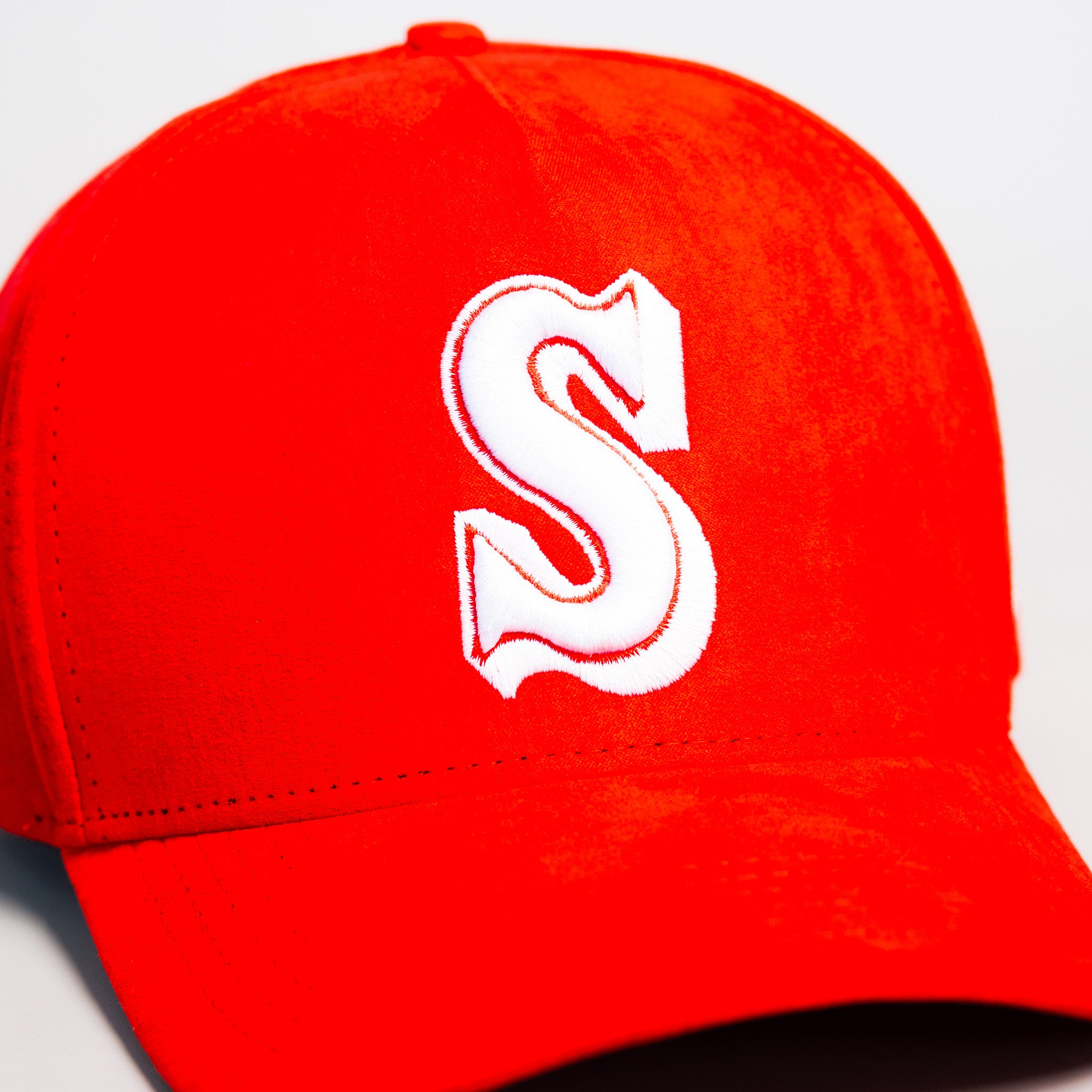 Samoa Red Suede Snapback Hat with White S Logo and Coat of Arms Patch - Front Detail