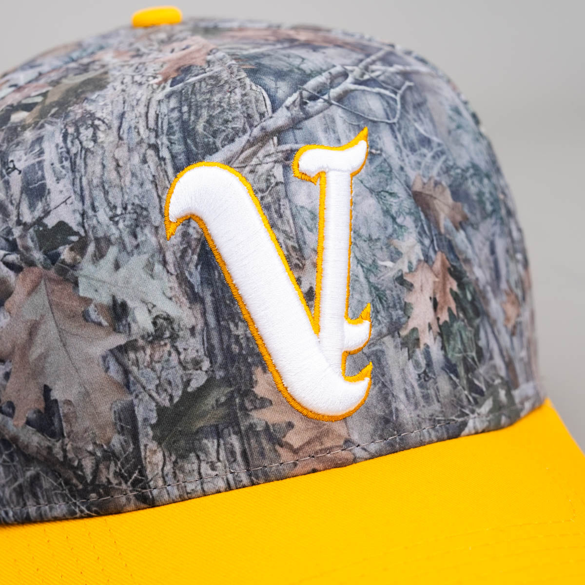 The Valley Hat Camo and Yellow 801 Snapback - Front Detail