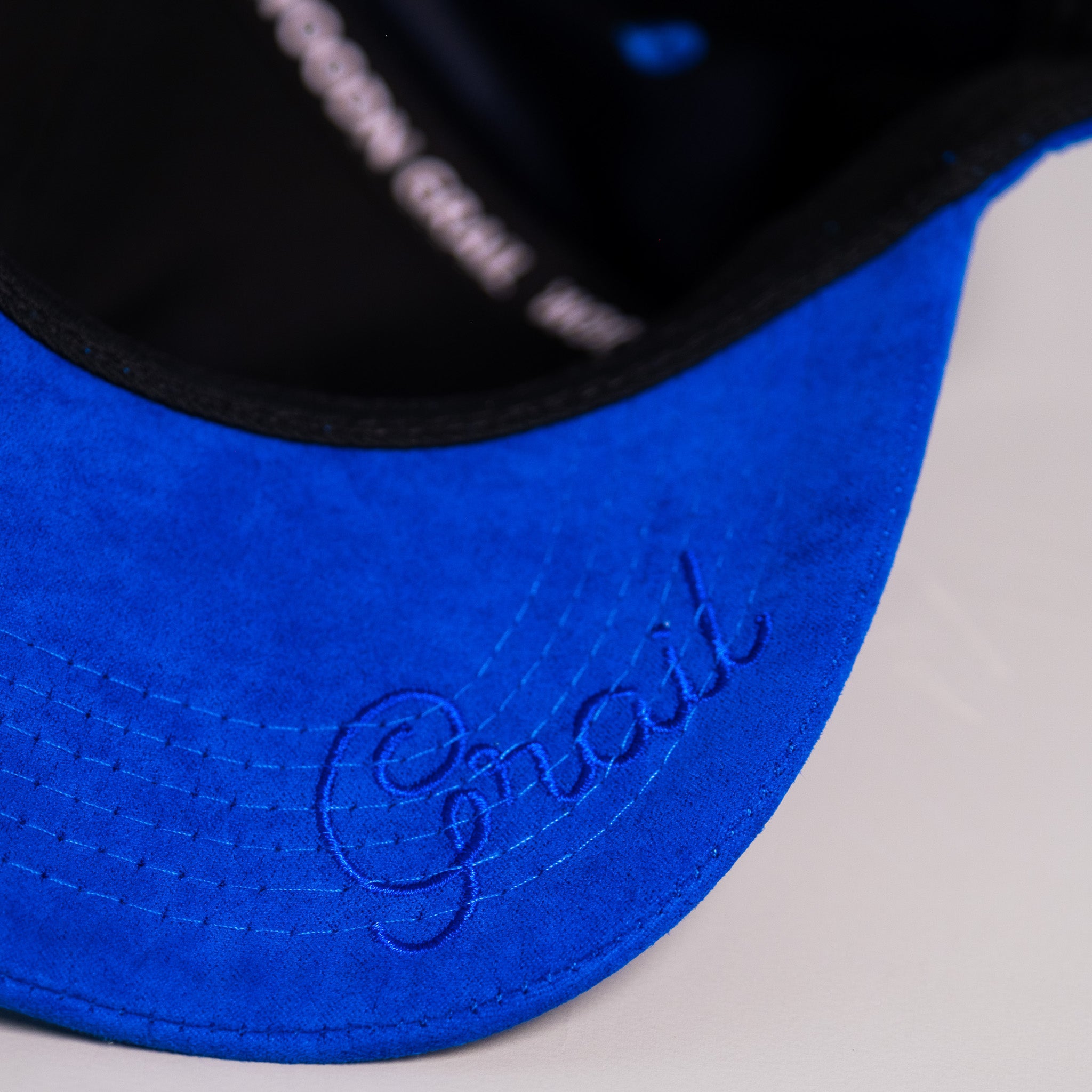 Tonga Blue Suede Snapback Hat with White T Logo and Coat of Arms Patch - Underbrim Detail