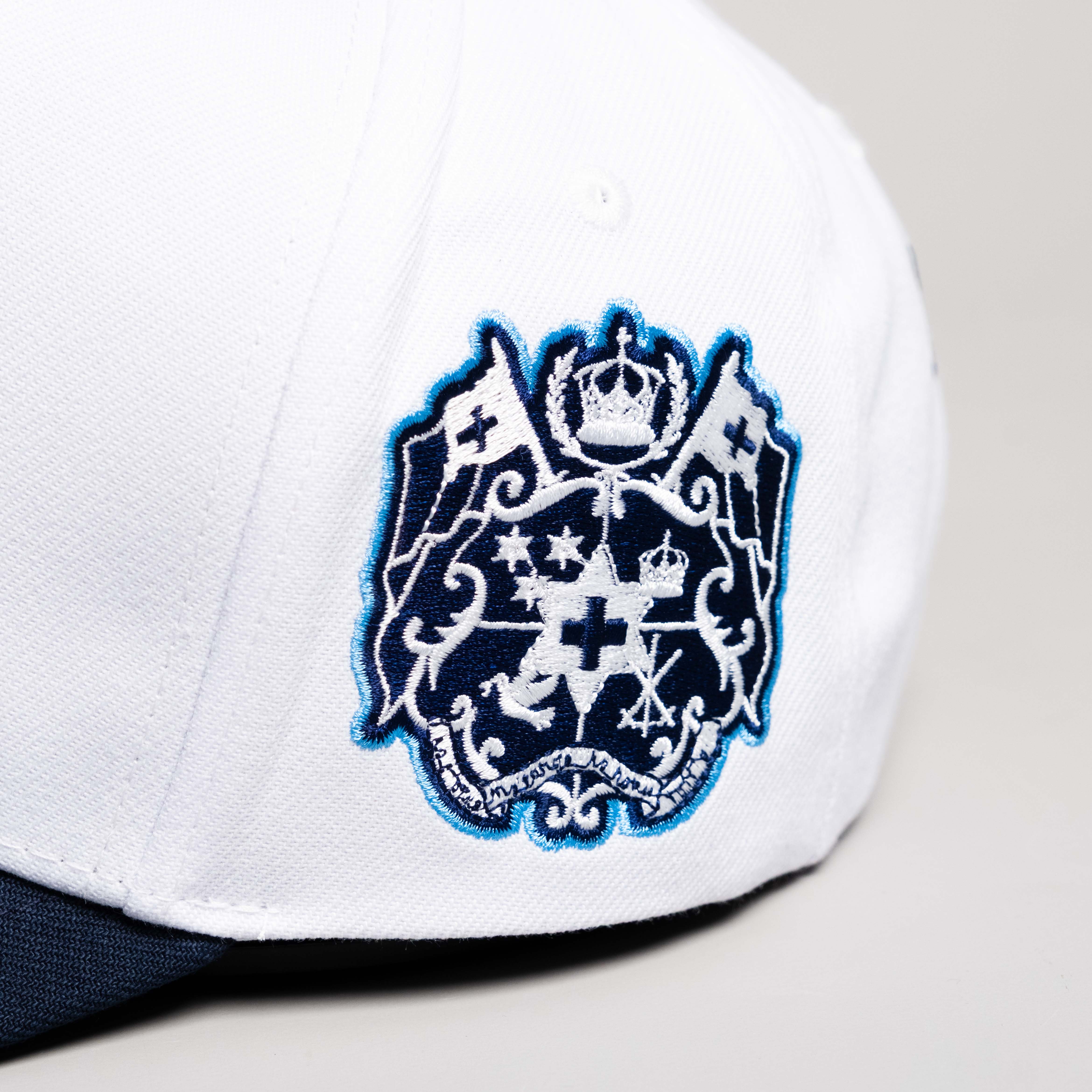 Tonga Hat White Navy Block T Snapback - Side Crest Detail
