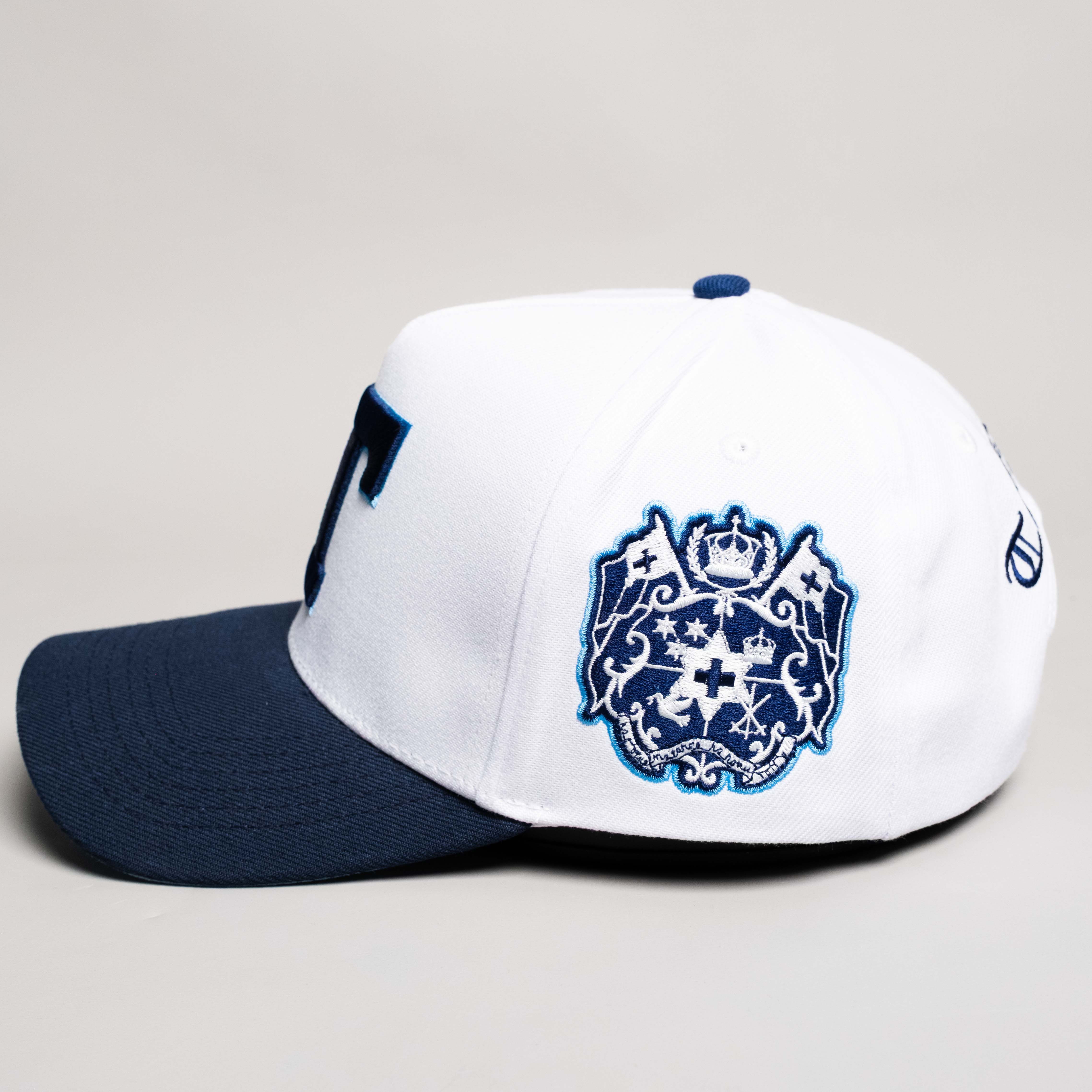 Tonga Hat White Navy Block T Snapback - Side Crest