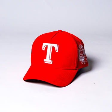 Tonga Red Suede Snapback Hat with White T Logo and Coat of Arms Patch - Angled View