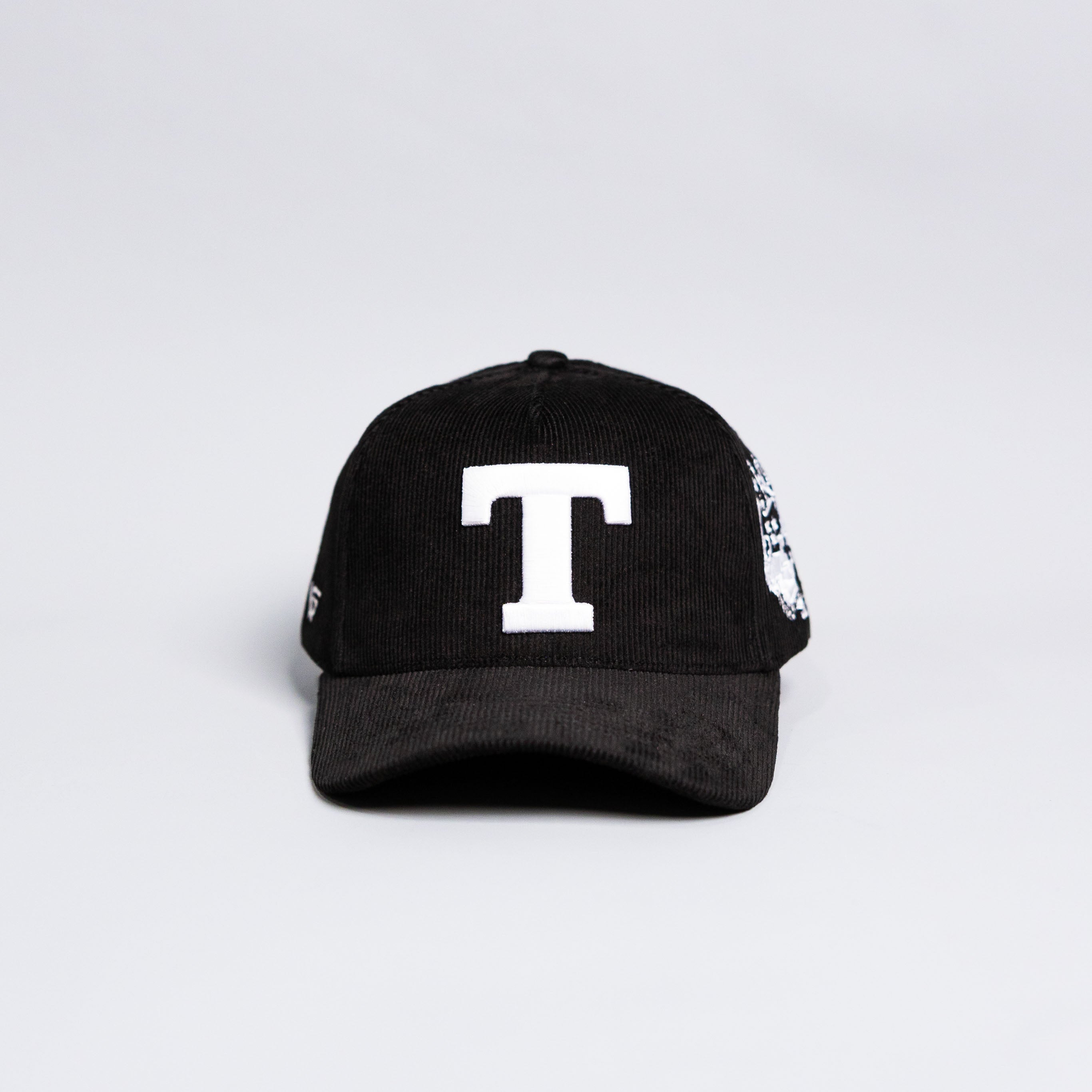 Tonga T Hat Black Corduroy Brim White Logo Coat of Arms Patch Snapback - Front Panel