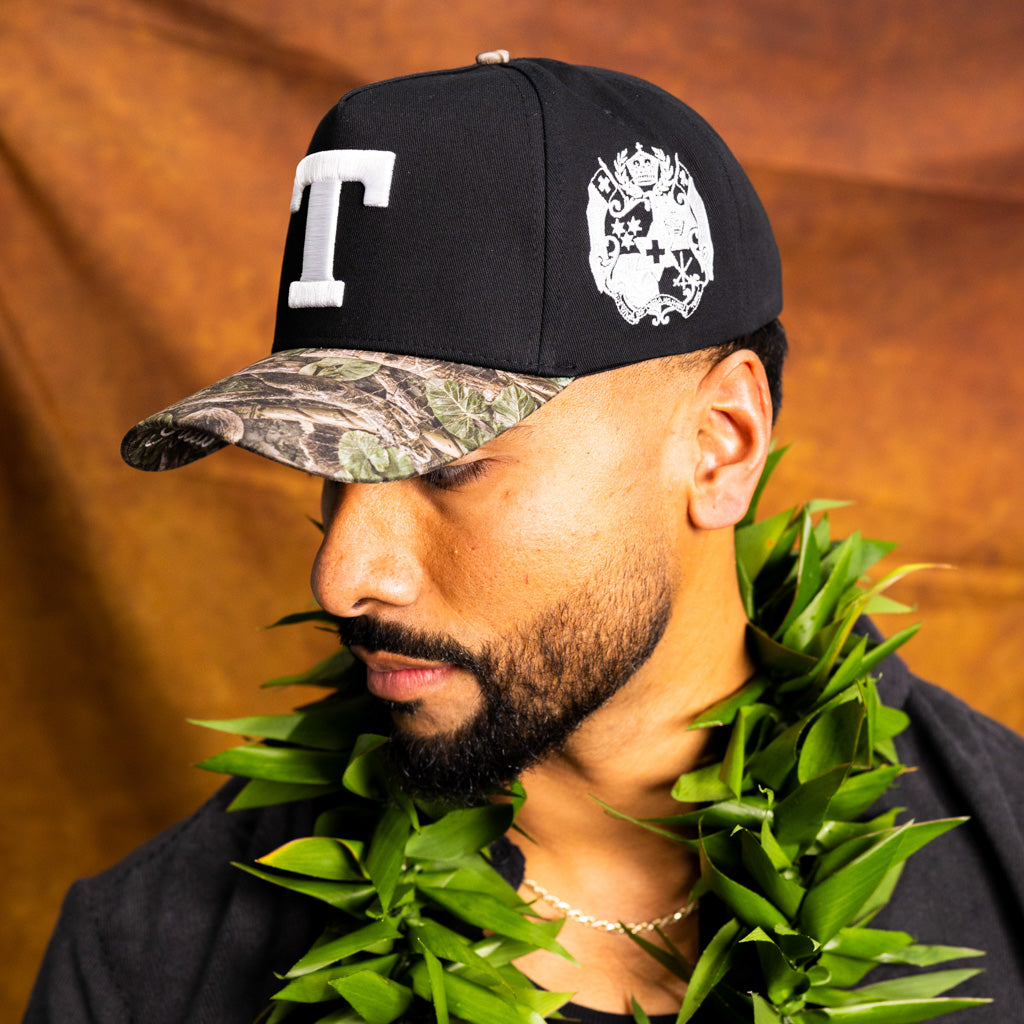 Tonga T Hat Black Polynesian Camo Brim White Logo Coat of Arms Snapback - On Model Lifestyle