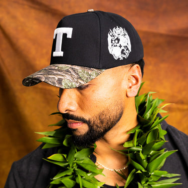 Tonga T Hat Black Polynesian Camo Brim White Logo Coat of Arms Snapback - On Model Lifestyle