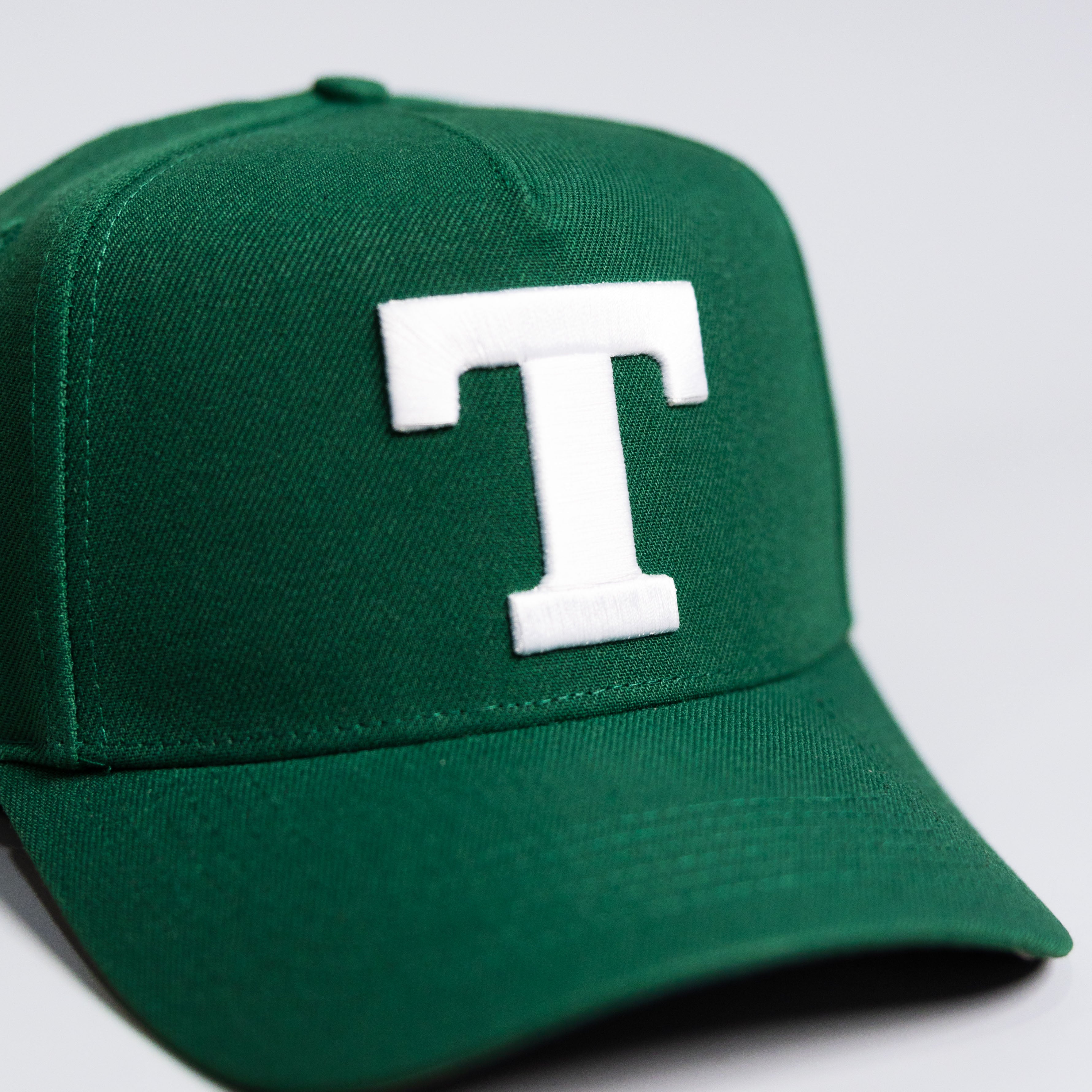 Tonga T Hat Green White Logo Gold Coat of Arms Patch Snapback - Front Detail