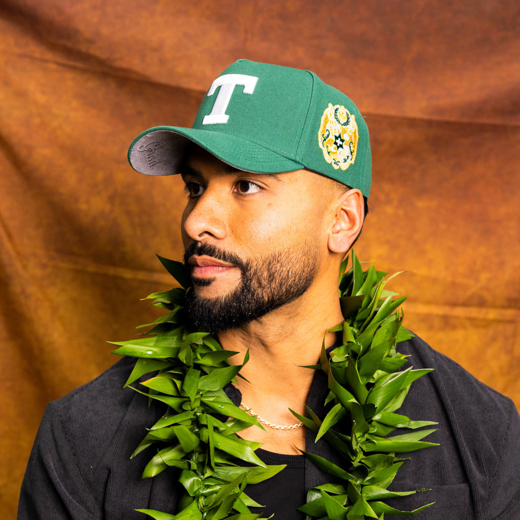 Tonga T Hat Green White Logo Gold Coat of Arms Patch Snapback - On Model Portrait Lifestyle