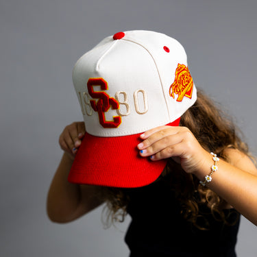 USC Trojans Kids Hat Cream & Cardinal 1880 Snapback - On Model Held Lifestyle