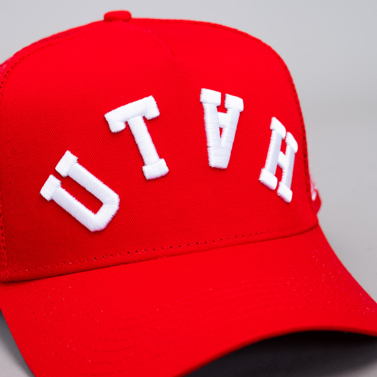 Utah Mesh Trucker Hat Red Snapback with Bold UTAH Script - Front Detail